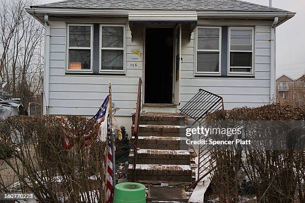 Flood damaged home is viewed in Oakwood Beach in Staten Island on February 5, 2013 in New York City. In a program proposed by New York Governor...