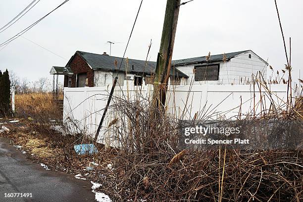 Flood damaged home is viewed in Oakwood Beach in Staten Island on February 5, 2013 in New York City. In a program proposed by New York Governor...