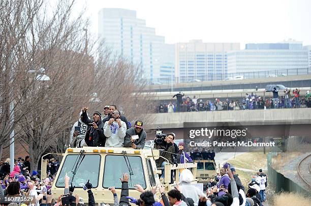 Torrey Smith and Anquan Bolden of the Baltimore Ravens celebrate with their teammates as they celebrate during their Super Bowl XLVII victory parade...