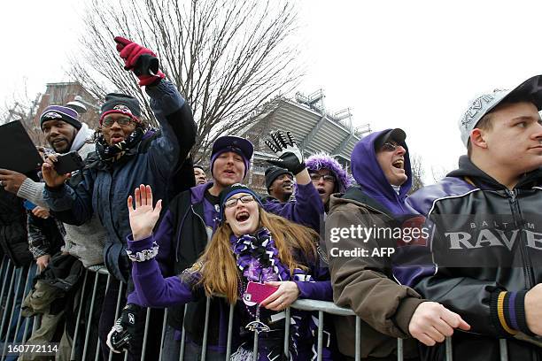 Baltimore Ravens fans cheer the during the Ravens Super Bowl victory parade and rally in Baltimore, Maryland on February 5, 2013. The Ravens defeated...