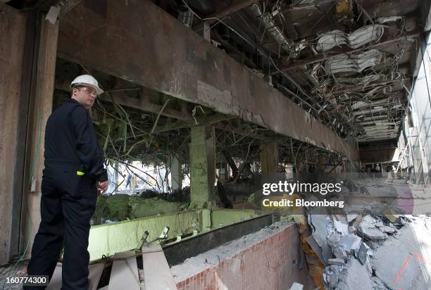 An explosives expert inspects the site of the blast at the Petroleos Mexicanos headquarters building in Mexico City, Mexico, on Tuesday, Feb. 5,...