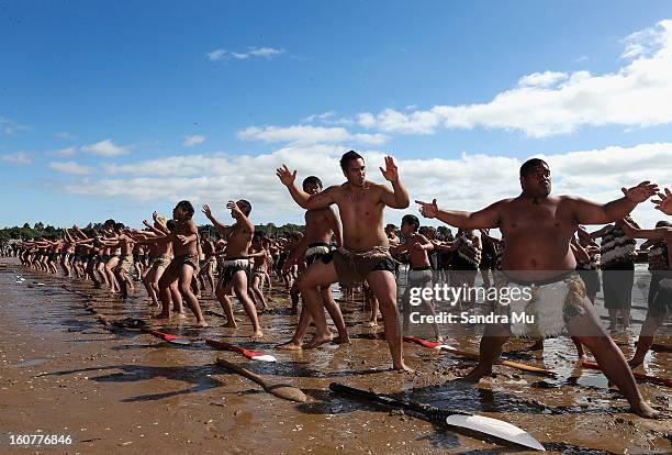Hundreds of Waka Ama crew perform the haka on the beach to celebrate Waitangi Day on February 6, 2013 in Waitangi, New Zealand. The Waitangi Day...