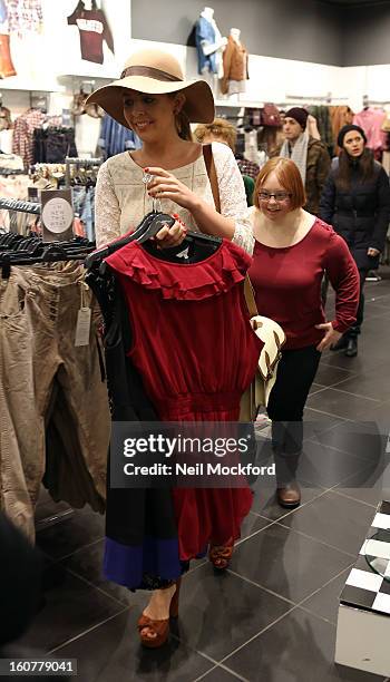 Lydia Bright gives Kate Brackley from "The Undateables" a makeover at New Look, Oxford St on February 5, 2013 in London, England.