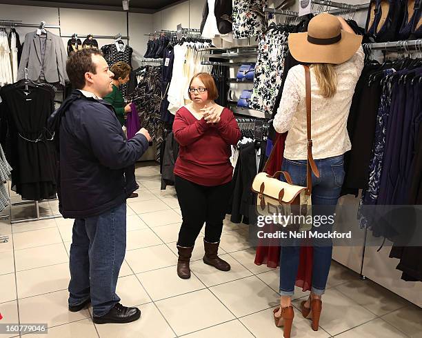 Lydia Bright gives Simon Macgregor and Kate Brackley from "The Undateables" a makeover at New Look, Oxford St on February 5, 2013 in London, England.