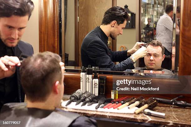 Simon Macgregor receives a makeover at Nicky Clarke Hair Salon on February 5, 2013 in London, England.