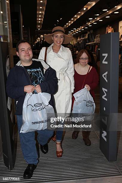 Lydia Bright gives Simon Macgregor and Kate Brackley from "The Undateables" a makeover at New Look, Oxford St on February 5, 2013 in London, England.