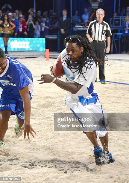 Rapper Lil Wayne attends DIRECTV'S Seventh Annual Celebrity Beach Bowl at DTV SuperFan Stadium at Mardi Gras World on February 2, 2013 in New...