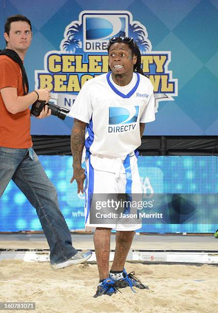 Rapper Lil Wayne attends DIRECTV'S Seventh Annual Celebrity Beach Bowl at DTV SuperFan Stadium at Mardi Gras World on February 2, 2013 in New...