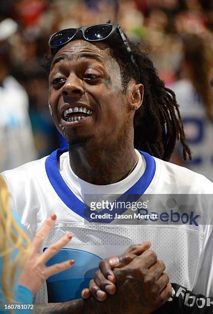 Rapper Lil Wayne attends DIRECTV'S Seventh Annual Celebrity Beach Bowl at DTV SuperFan Stadium at Mardi Gras World on February 2, 2013 in New...
