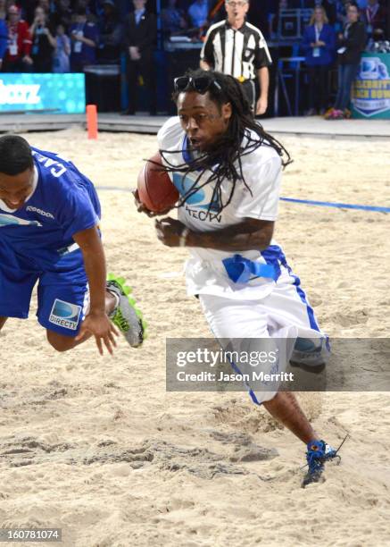 Rapper Lil Wayne attends DIRECTV'S Seventh Annual Celebrity Beach Bowl at DTV SuperFan Stadium at Mardi Gras World on February 2, 2013 in New...