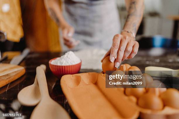 woman making homemade pasta - semolina milk stock pictures, royalty-free photos & images