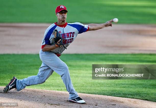 Pitcher Efrain Nieves of Criollos de Caguas of Puerto Rico, pitches against Magallanes of Venezuela, during the 2013 Caribbean baseball series, on...