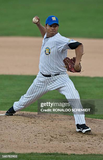 Pitcher Yeiper Castillo of Magallanes of Venezuela pitches against Criollos de Caguas of Puerto Rico, during the 2013 Caribbean baseball series, on...