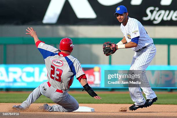 Jesus Feliciano of Puerto Rico and Osuna Renny of Venezuela in action during a match between Puerto Rico and Venezuela as part of the Caribbean...