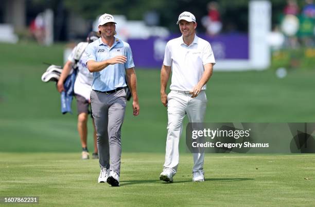 Sam Burns of the United States and Russell Henley of the United States walk on the tenth hole during the second round of the FedEx St. Jude...
