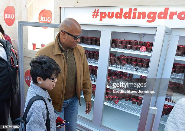 Ronnie Lott hands out JELL-O pudding at the JELL-O Make The Taste of Defeat Sweet on February 5, 2013 in San Francisco, California.
