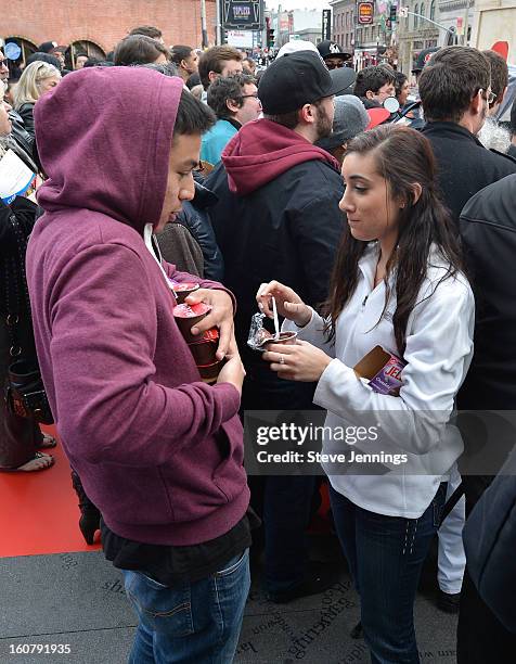 Crowd is served JELL-O pudding at the JELL-O Make The Taste of Defeat Sweet on February 5, 2013 in San Francisco, California.