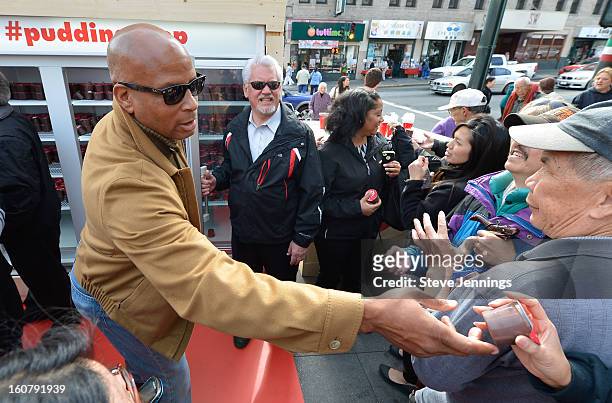 Ronnie Lott hands out JELL-O pudding at the JELL-O Make The Taste of Defeat Sweet on February 5, 2013 in San Francisco, California.