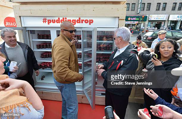 Ronnie Lott hands out JELL-O Pudding at the JELL-O Make The Taste of Defeat Sweet on February 5, 2013 in San Francisco, California.