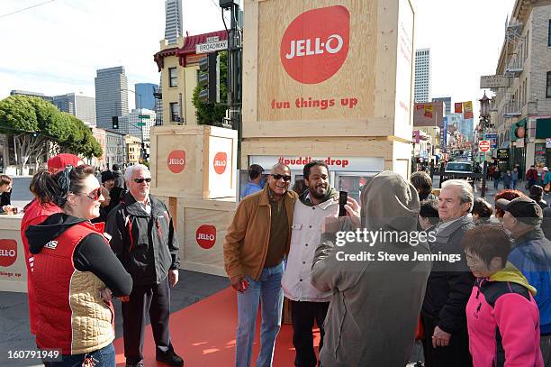 Ronnie Lott poses with fans at the JELL-O Make The Taste of Defeat Sweet on February 5, 2013 in San Francisco, California.