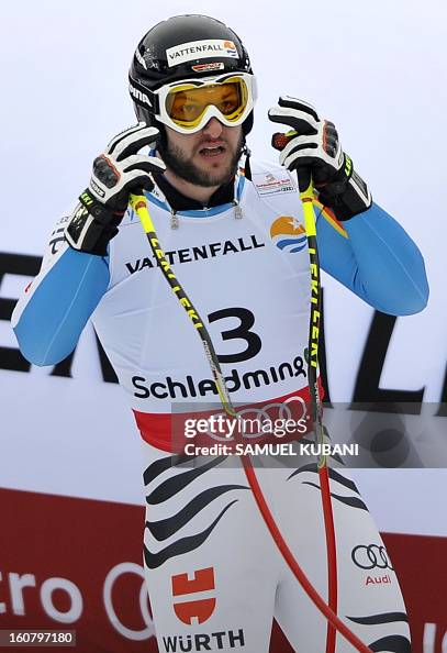 Germany's Stephan Keppler reacts at finish line during the men's
