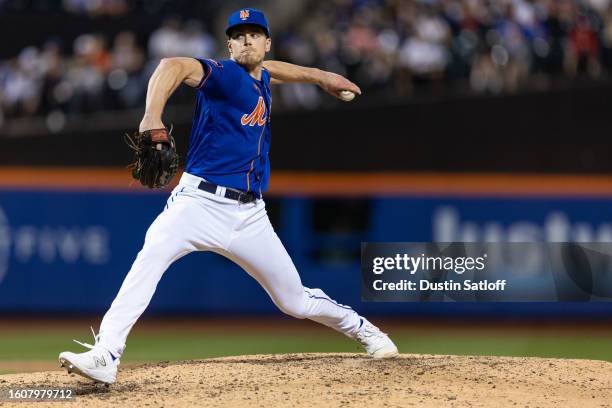 Josh Walker of the New York Mets throws a pitch during the eighth inning of the game against the Chicago Cubs at Citi Field on August 08, 2023 in New...