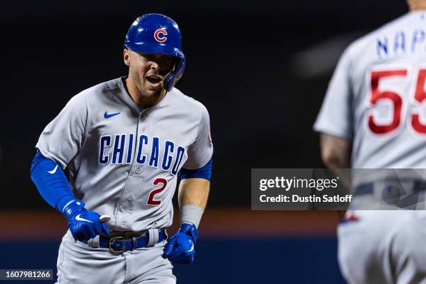 Nico Hoerner of the Chicago Cubs reacts after hitting a single during the eighth inning of the game against the New York Mets at Citi Field on August...