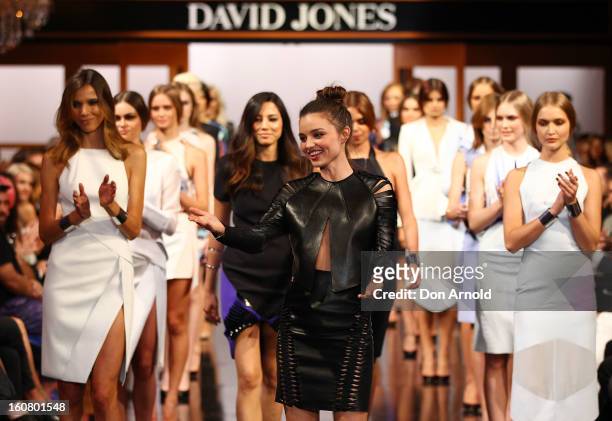 Miranda Kerr greets Dion Lee as she showcases designs by Dion Lee on the catwalk during the David Jones A/W 2013 Season Launch at David Jones...