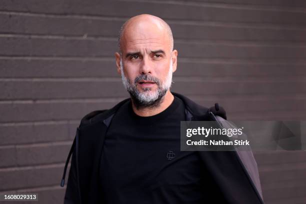Josep Guardiola, Head Coach of Manchester City arrives at the stadium prior to the Premier League match between Burnley FC and Manchester City at...