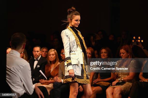 Miranda Kerr showcases designs by Josh Goot on the runway during the David Jones A/W 2013 Season Launch at David Jones Castlereagh Street on February...