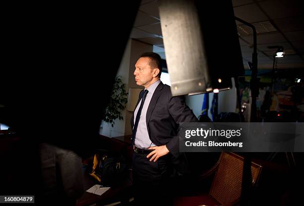 Yannis Stournaras, Greece's finance minister, waits ahead of a Bloomberg Television interview in his office in Athens, Greece, on Wednesday, Feb. 6,...