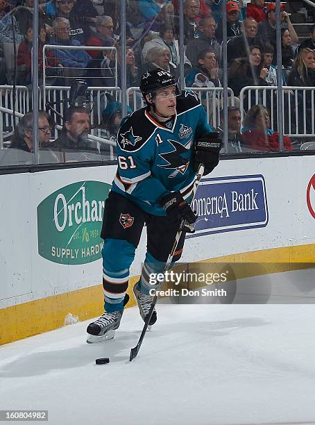 Justin Braun of the San Jose Sharks handles the puck against the Nashville Predators during an NHL game on February 2, 2013 at HP Pavilion in San...