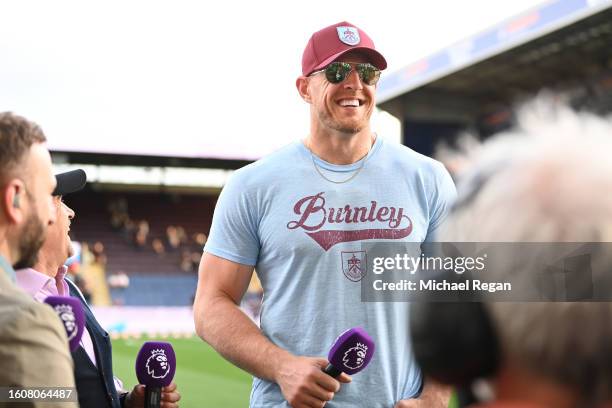 Watt is interviewed prior to the Premier League match between Burnley FC and Manchester City at Turf Moor on August 11, 2023 in Burnley, England.