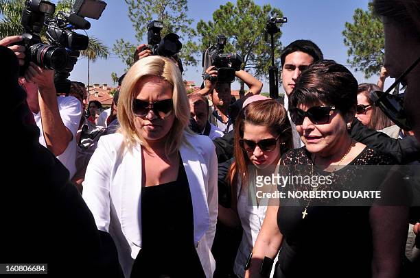 Paraguayan national deputy Faviola Oviedo and Raquel Marin de Oviedo, daughter and wife respectively, of former general and UNACE party presidential...