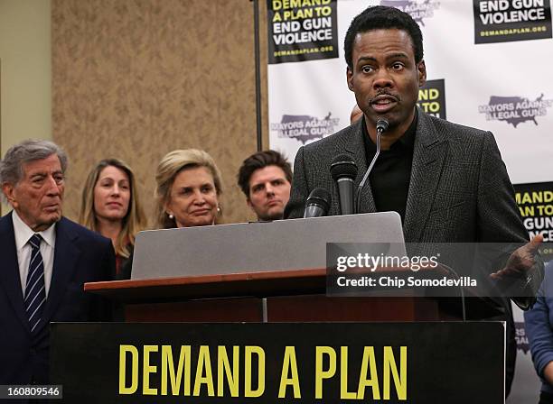Actor Chris Rock speaks during a press conference hosted by the Mayors Against Illegal Guns and the Law Center to Prevent Gun Violence with singer...