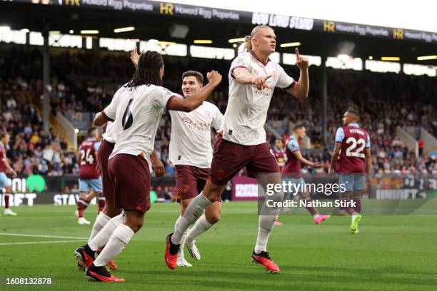 Erling Haaland of Manchester City celebrates after scoring the team's first goal during the Premier League match between Burnley FC and Manchester...