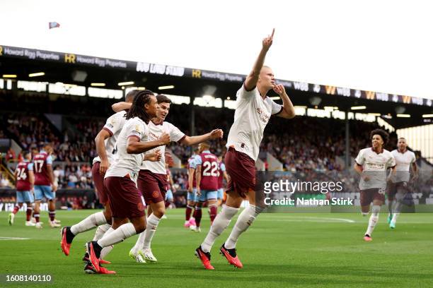 Erling Haaland of Manchester City celebrates after scoring the team's first goal during the Premier League match between Burnley FC and Manchester...