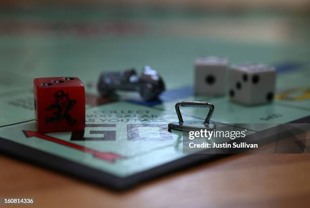 In this photo illustration, The Monopoly iron game piece is displayed on February 6, 2013 in Fairfax, California. Toy maker Hasbro, Inc. Announced...