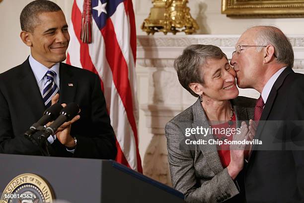 Chief Executive Officer Sally Jewell is congratulated by outgoing Interior Secrtary Ken Salazar after she was nominated by President Barack Obama to...