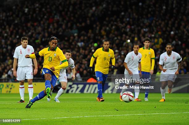 Ronaldinho of Brazil shoots and sees his penalty saved by Joe Hart of England during the International friendly between England and Brazil at Wembley...