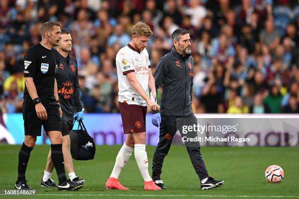 Kevin De Bruyne of Manchester City is substituted after sustaining an injury during the Premier League match between Burnley FC and Manchester City...