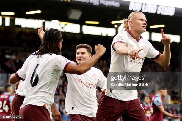 Erling Haaland of Manchester City celebrates after scoring the team's first goal during the Premier League match between Burnley FC and Manchester...