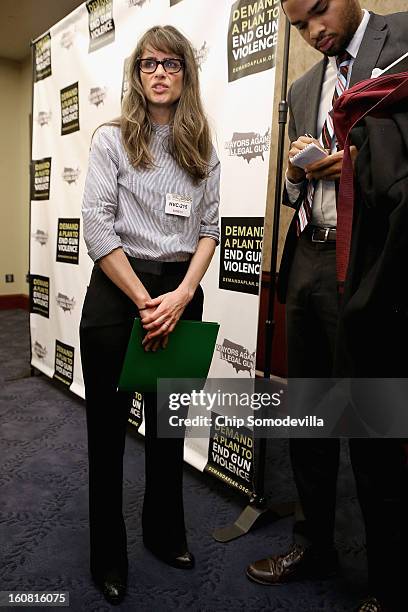 Actor Amanda Peet talks with journalists after participating in a news conference hosted by the Mayors Against Illegal Guns and the Law Center to...