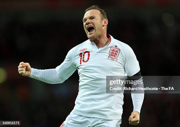 Wayne Rooney of England celebrates after scoring England's first goal during the International Friendly match between England and Brazil at Wembley...