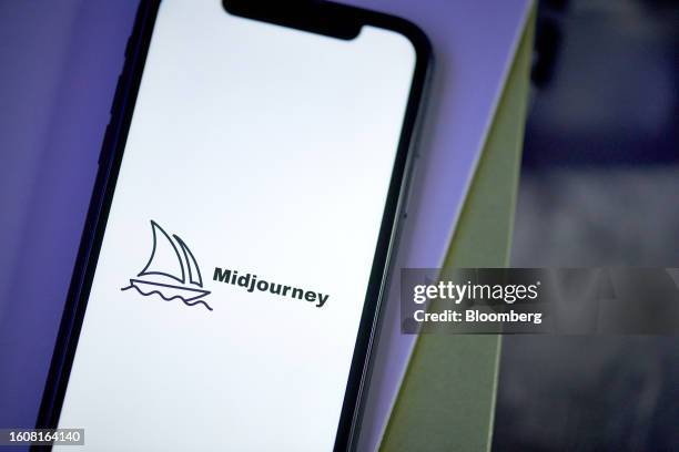 The Midjourney logo on a smartphone arranged in New York, US, on Thursday, Aug. 17, 2023. Gala Sports used publicly available AI services, image...