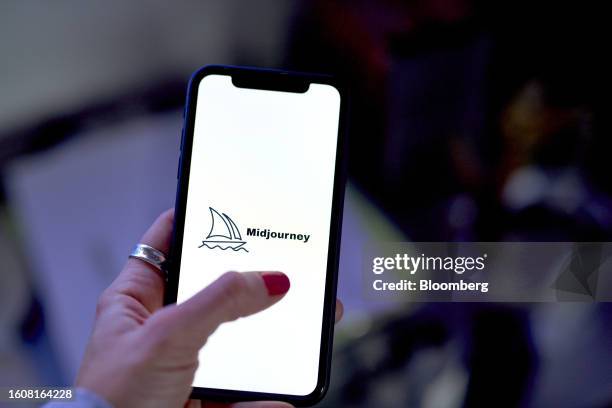 The Midjourney logo on a smartphone arranged in New York, US, on Thursday, Aug. 17, 2023. Gala Sports used publicly available AI services, image...