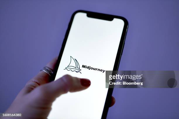 The Midjourney logo on a smartphone arranged in New York, US, on Thursday, Aug. 17, 2023. Gala Sports used publicly available AI services, image...