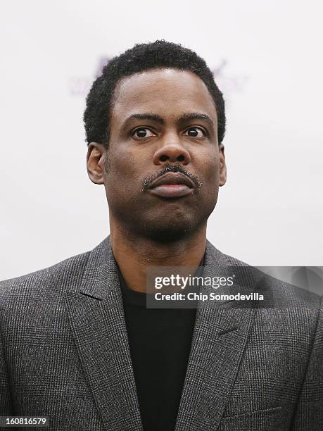 Actor Chris Rock participates in a press conference hosted by the Mayors Against Illegal Guns and the Law Center to Prevent Gun Violence at the U.S....