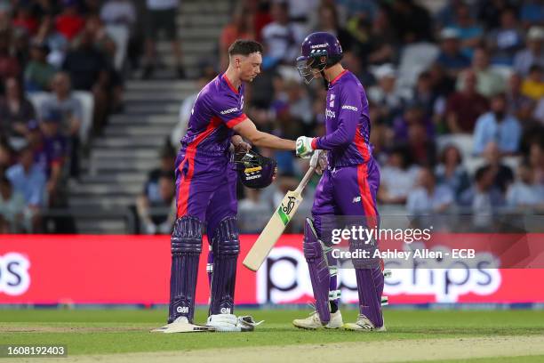 Adam Hose and Tom Banton of Northern Superchargers celebrate their fifty partnership during The Hundred match between Northern Superchargers Men and...