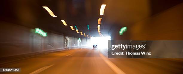driving through a tunnel - light at the end of the tunnel car stock pictures, royalty-free photos & images
